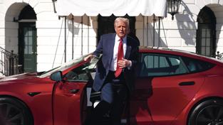 U.S. President Donald Trump gets out of a Tesla Model S on the South Lawn of the White House on March 11, 2025.